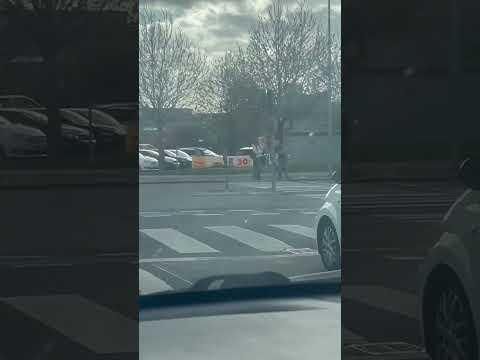 McDonald's Sign Windy Dancing To Irish Music On Car Stereo