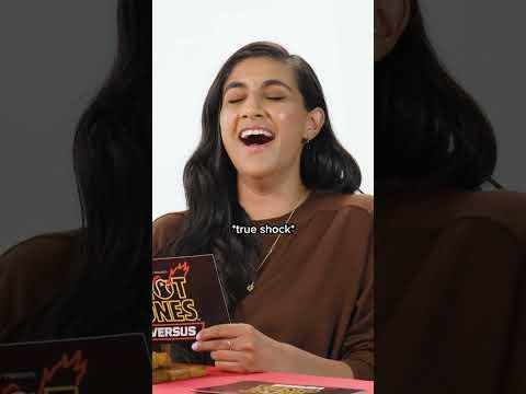Would Dax prank call Brad Pitt?? 🔥 Armchair Expert takes on Hot Ones Versus!
