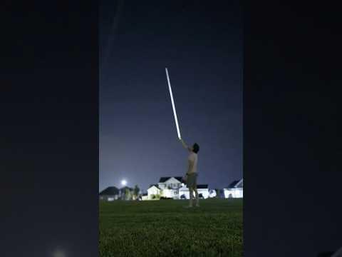 Can High Voltage Power Lines Light Up a Bulb In Your Hand?