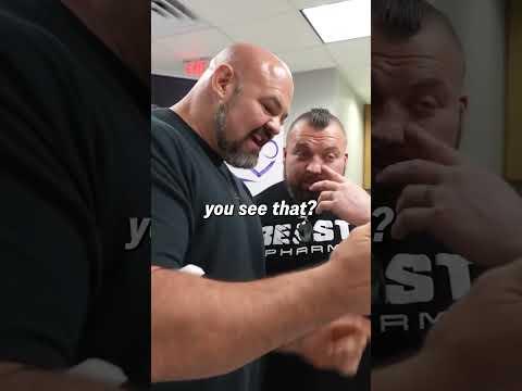 Brian Shaw Pushes Eddie Hall Through Store