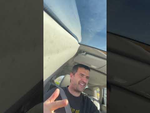 Middle aged man in hot car