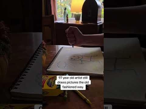 97 year old artist still draws pictures the old fashioned way.
