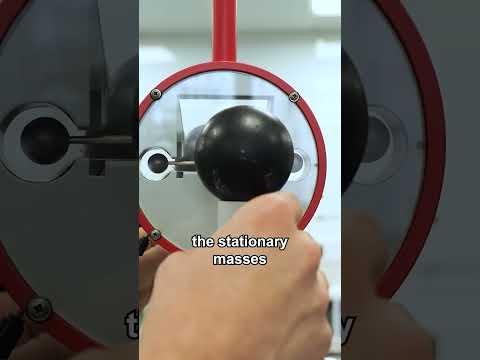 Watch gravity bring these two balls together in real time